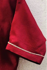 Cotton-silk Chanderi Maroon crop top with sujani work on neck line.