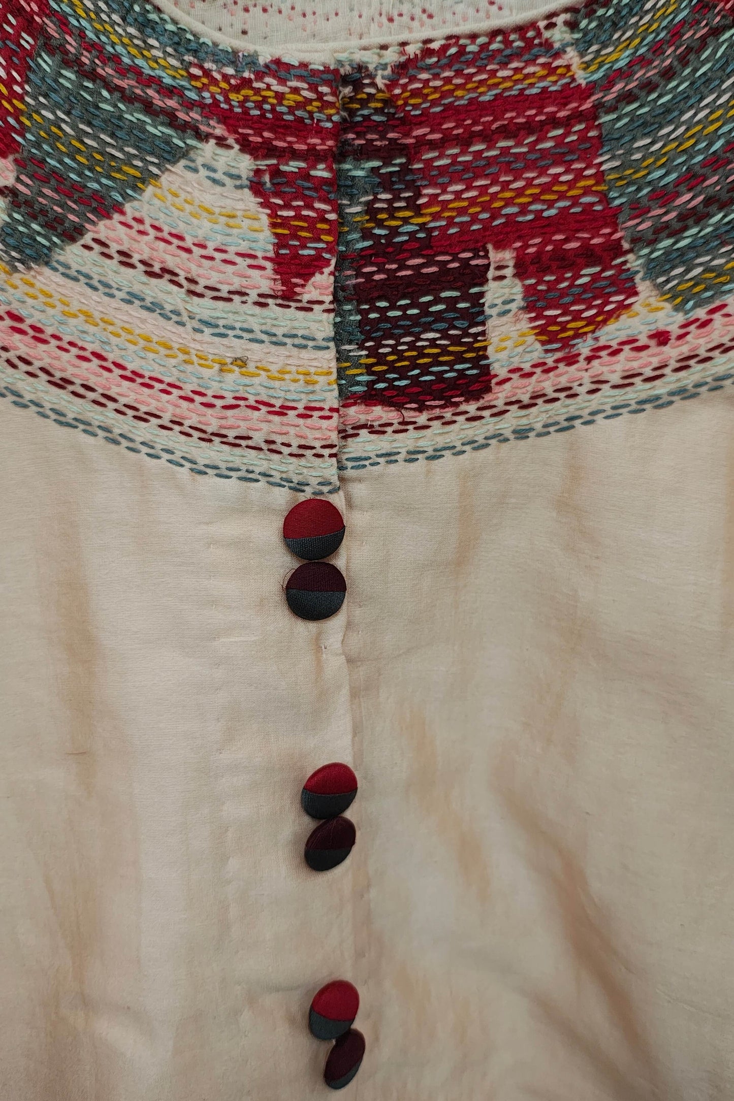 Chanderi Peach Crop Top with Sujani Embroidery on Neckline.