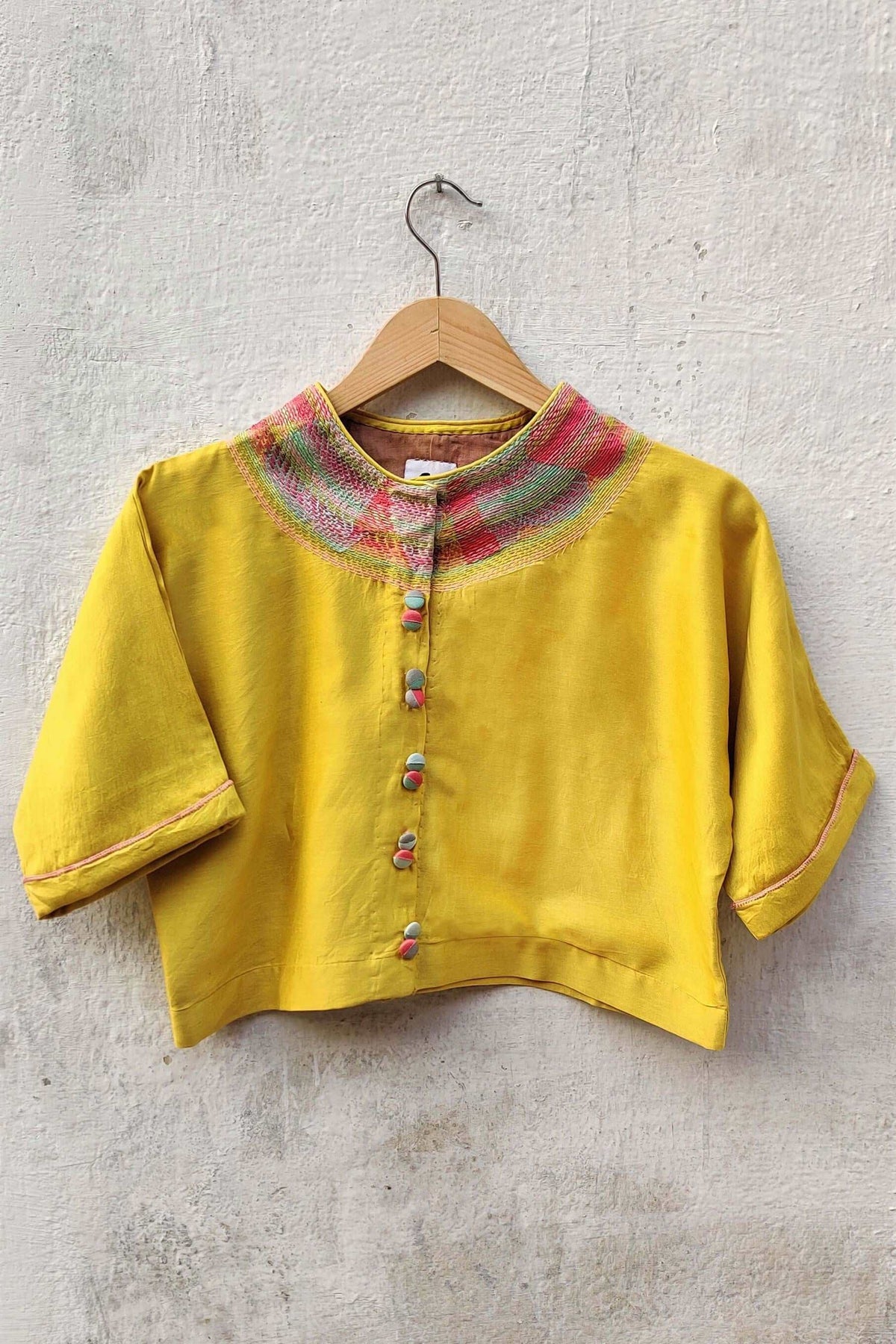Cotton-silk Yellow crop top with sujani work on neck line.