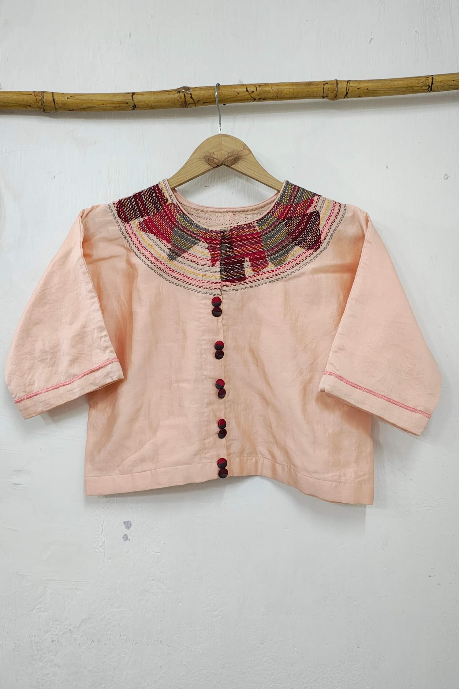 Chanderi Peach Crop Top with Sujani Embroidery on Neckline.